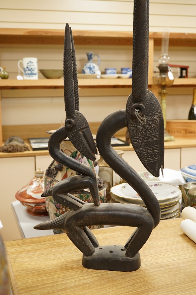 African tribal art interest; a Bambara antelope headdress chiwara, 93cm high